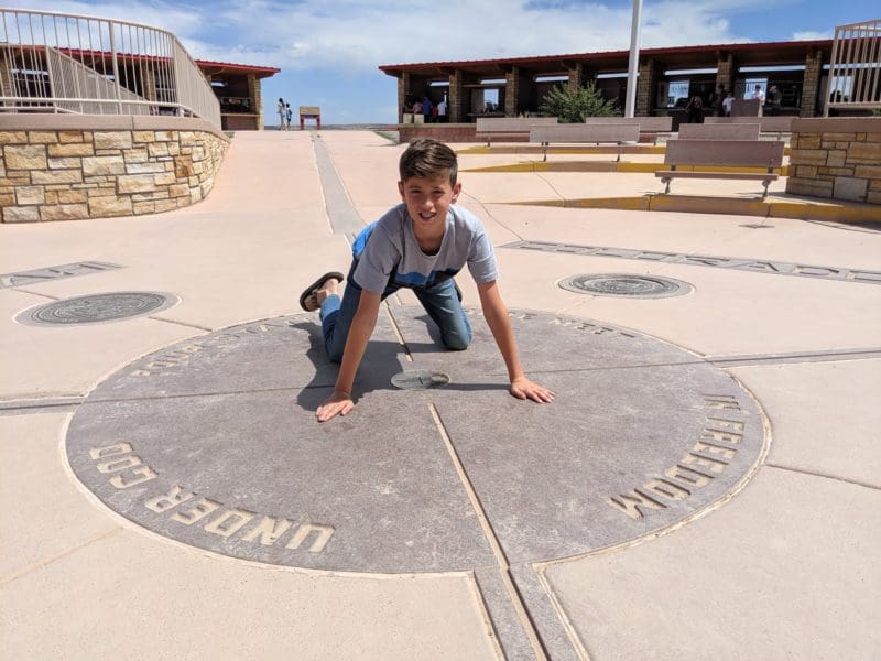 boy in four states at once - Tips for visiting Four Corners Monument